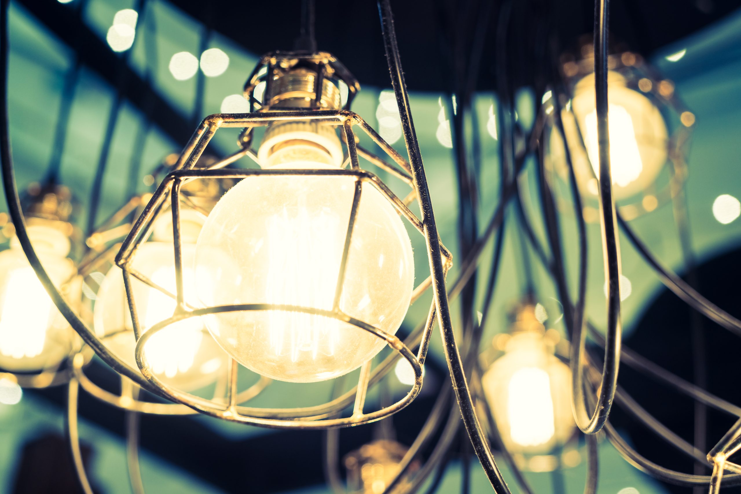 Soft focus on light bulb lamp decoration interior of room - vintage filter