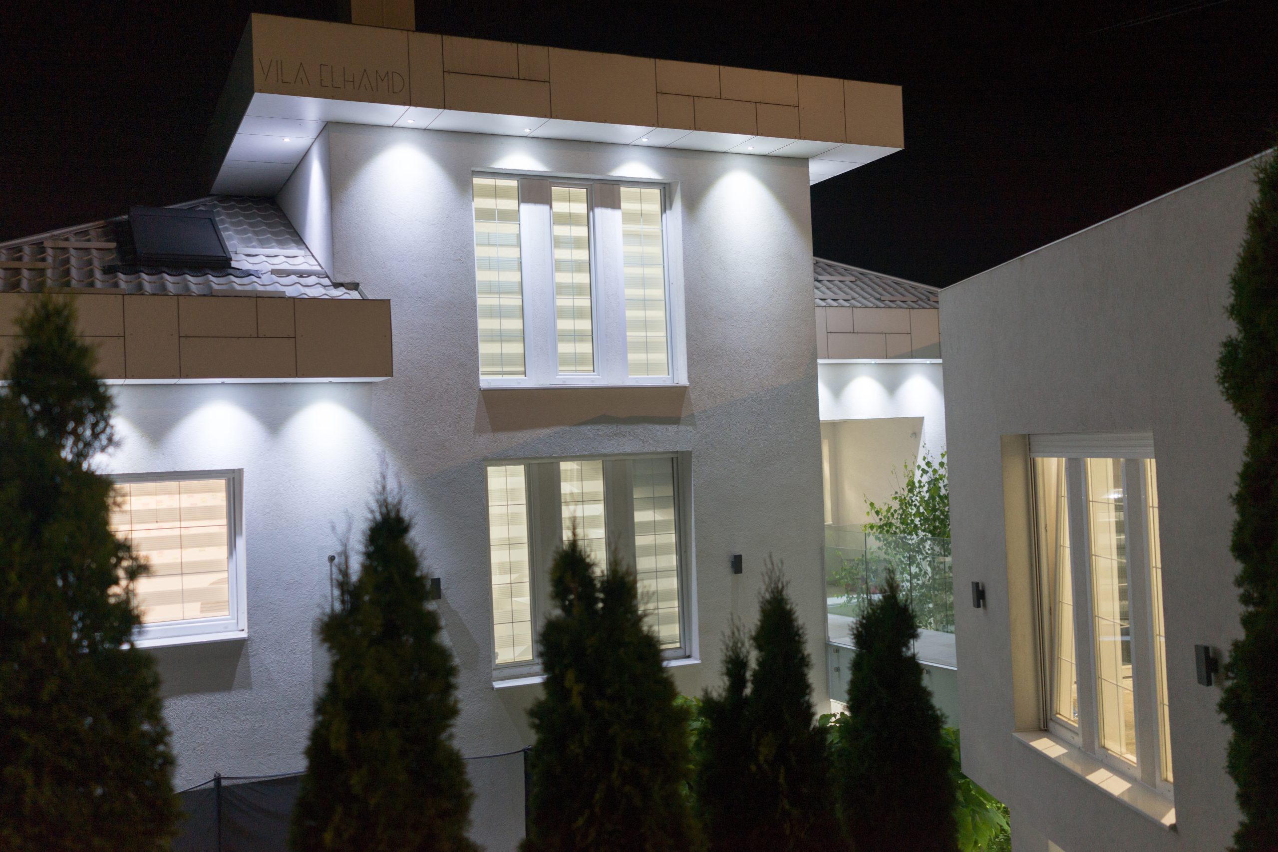 Night view of white beautiful modern house